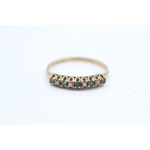 185 - 9ct gold diamond and emerald nine stone eternity ring (1.3g) Size  O