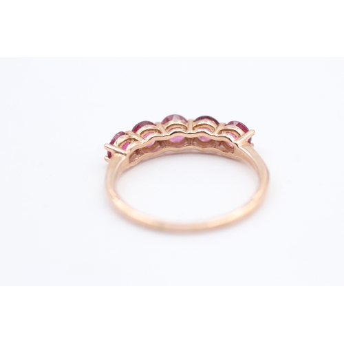 186 - 10kt rose gold pink tourmaline five stone eternity ring (1.9g) Size  O