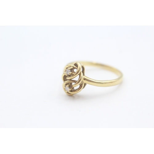 197 - 18ct gold diamond set eternal knot celtic style dress ring (3.5g) Size  P