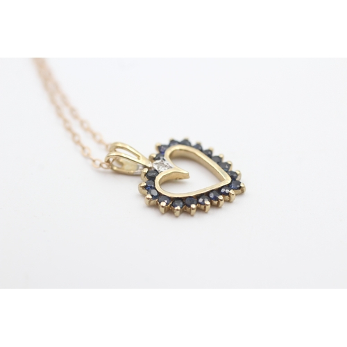 199 - 9ct gold sapphire set open heart pendant necklace (1.7g)