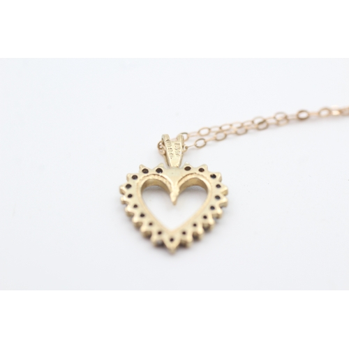 199 - 9ct gold sapphire set open heart pendant necklace (1.7g)