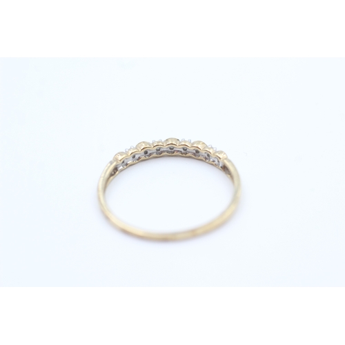 201 - 9ct gold diamond set half eternity ring (1.5g) Size  T 1/2