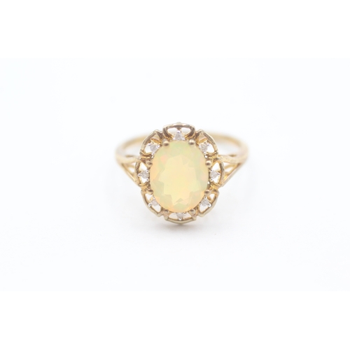 203 - 9ct gold diamond and opal set cluster ring (2.3g) Size  O