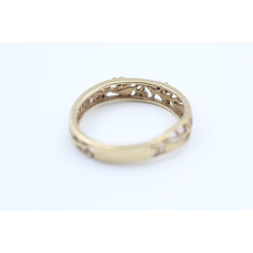 204 - 9ct gold diamond accented scrolling openwork ring - as found (1.8g) AS SEEN - MISSHAPEN Size  M