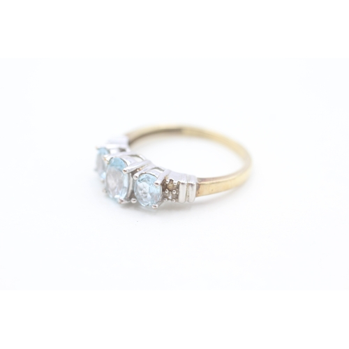 208 - 9ct gold diamond and blue topaz set dress ring (2.2g) Size  O