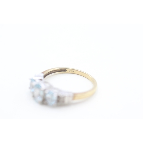 208 - 9ct gold diamond and blue topaz set dress ring (2.2g) Size  O