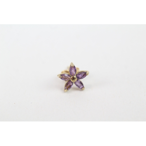 209 - 9ct gold amethyst set floral stud earrings (0.9g)