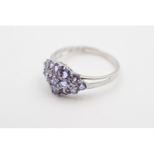 21 - 9ct white gold tanzanite and diamond set cluster ring (3.1g) Size  U