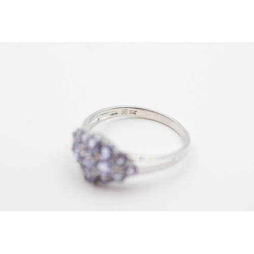 21 - 9ct white gold tanzanite and diamond set cluster ring (3.1g) Size  U