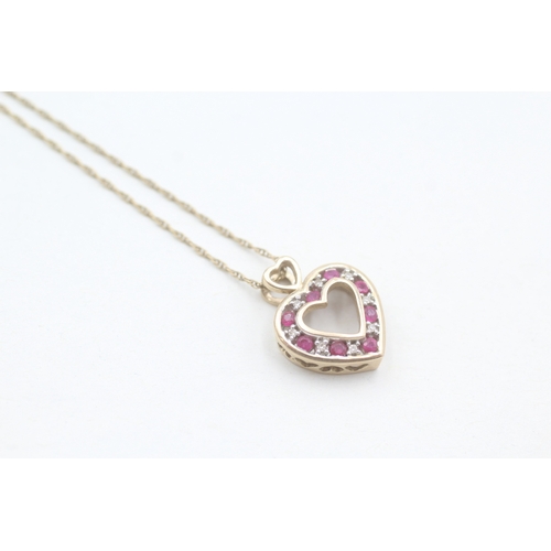 210 - 9ct gold diamond and ruby set open heart pendant necklace (3.1g)