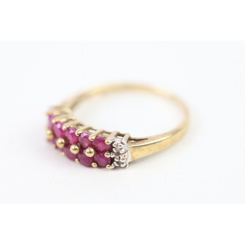 214 - 9ct gold diamond accented ruby et cluster band ring (2.1g) Size  N 1/2