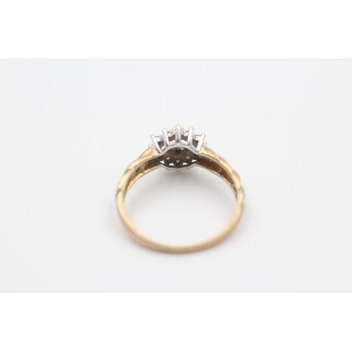 216 - 9ct gold diamond set cluster ring (1.8g) Size  M