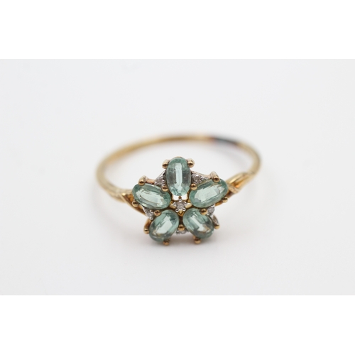 221 - 9ct gold diamond and green gemstone floral cluster ring (2.2g) Size  T 1/2