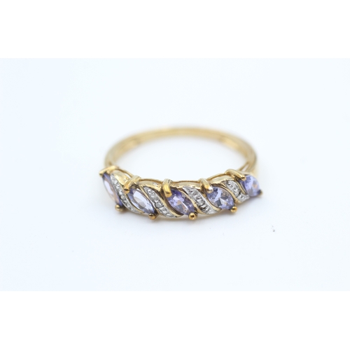 23 - 9ct gold diamond accented marquise cut tanzanite five stone eternity ring (2.1g) Size  P