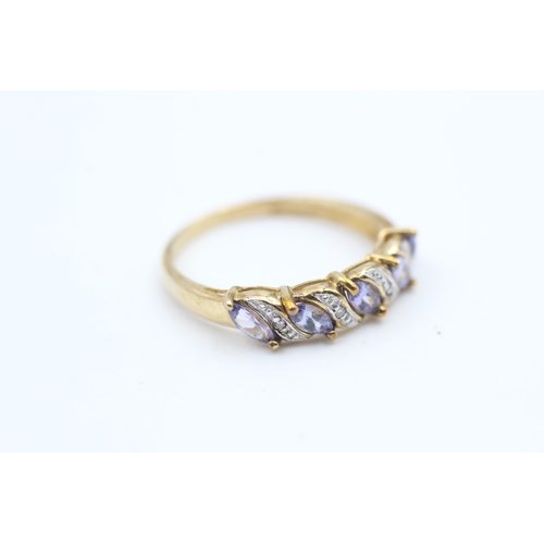 23 - 9ct gold diamond accented marquise cut tanzanite five stone eternity ring (2.1g) Size  P