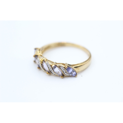 23 - 9ct gold diamond accented marquise cut tanzanite five stone eternity ring (2.1g) Size  P