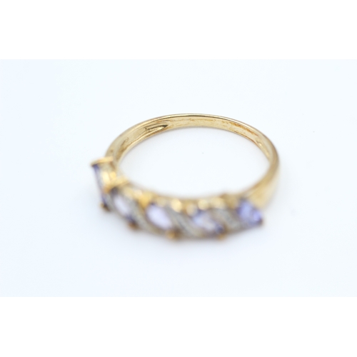 23 - 9ct gold diamond accented marquise cut tanzanite five stone eternity ring (2.1g) Size  P