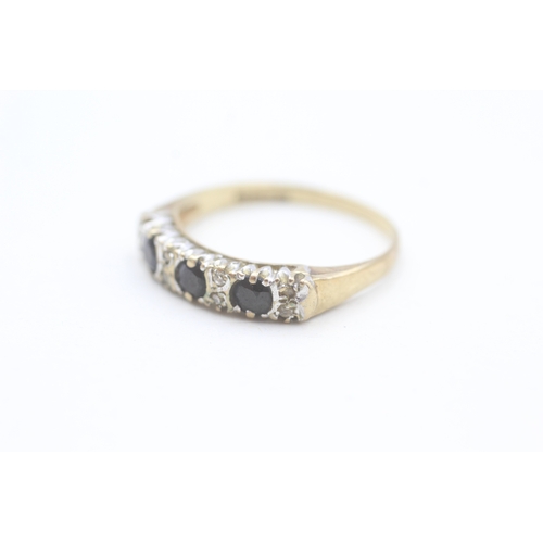 43 - 9ct gold diamond accented sapphire set half eternity ring (2.3g) Size  S