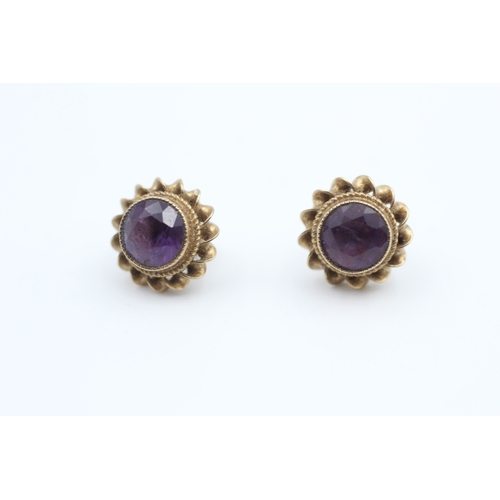 48 - 9ct gold rope twist amethyst stud earrings (2g)