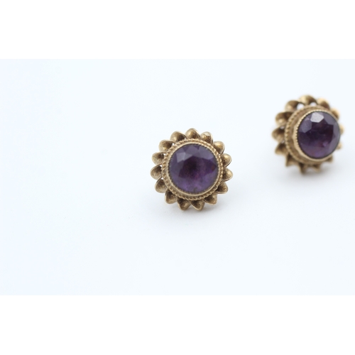 48 - 9ct gold rope twist amethyst stud earrings (2g)