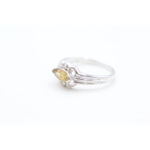 65 - 9ct white gold yellow tourmaline and white gemstone set dress ring (1.8g) Size  N 1/2