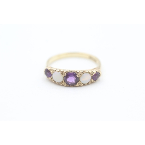 66 - 9ct gold amethyst and opal set five stone boat shaped ring (2.2g) Size  O