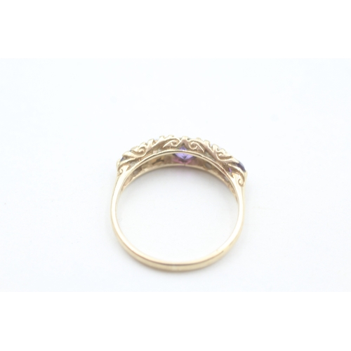 66 - 9ct gold amethyst and opal set five stone boat shaped ring (2.2g) Size  O