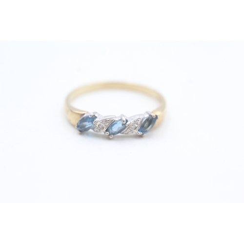 67 - 9ct gold diamond accented and blue topaz set band ring (1.8g) Size  P