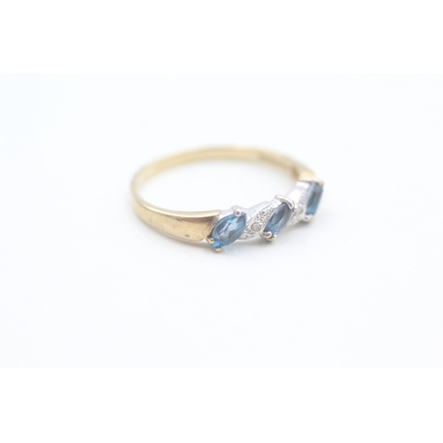 67 - 9ct gold diamond accented and blue topaz set band ring (1.8g) Size  P