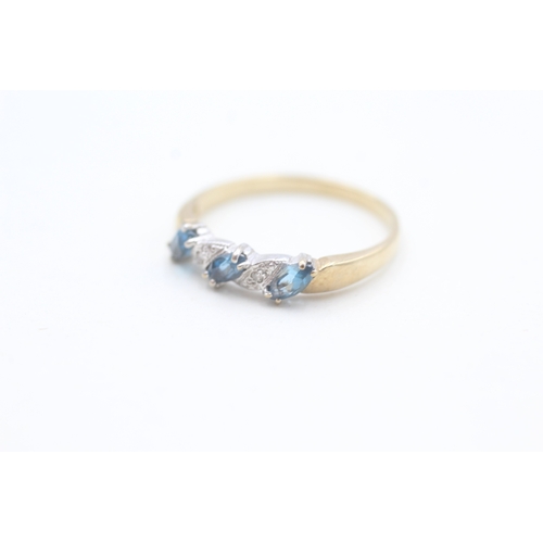 67 - 9ct gold diamond accented and blue topaz set band ring (1.8g) Size  P