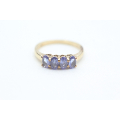 70 - 9ct gold tanzanite set four stone dress ring (2.3g) Size  O