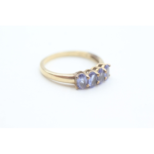 70 - 9ct gold tanzanite set four stone dress ring (2.3g) Size  O