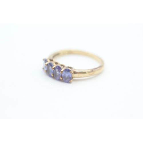 70 - 9ct gold tanzanite set four stone dress ring (2.3g) Size  O