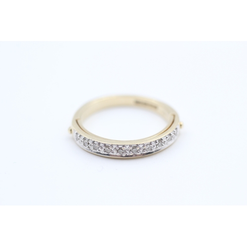 72 - 9ct gold diamond set half eternity ring - hidden message. (2.9g) Size  L