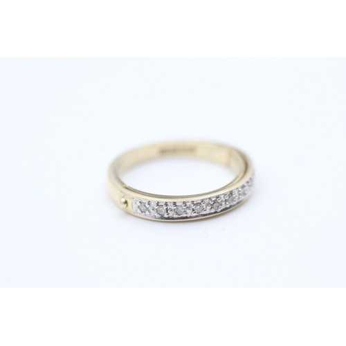 72 - 9ct gold diamond set half eternity ring - hidden message. (2.9g) Size  L