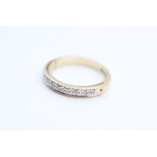 72 - 9ct gold diamond set half eternity ring - hidden message. (2.9g) Size  L