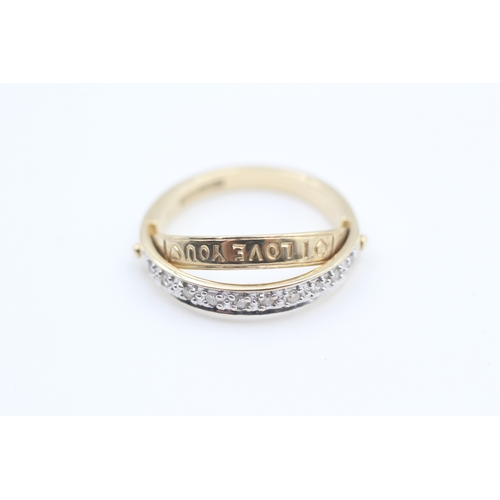 72 - 9ct gold diamond set half eternity ring - hidden message. (2.9g) Size  L