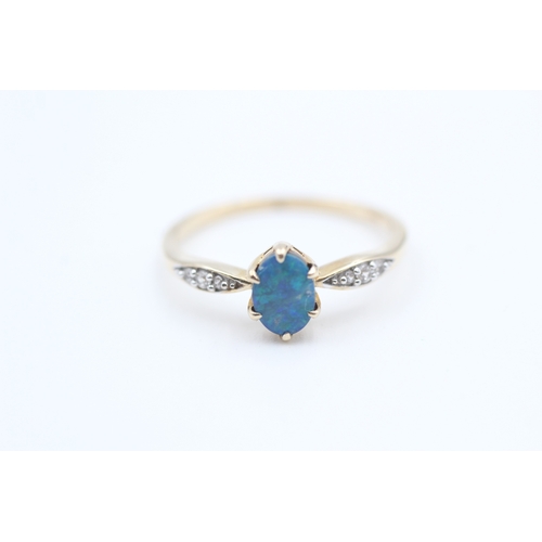 84 - 9ct gold white sapphire accented blue opal doublet set dress ring (1.9g) Size  S