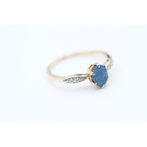 84 - 9ct gold white sapphire accented blue opal doublet set dress ring (1.9g) Size  S