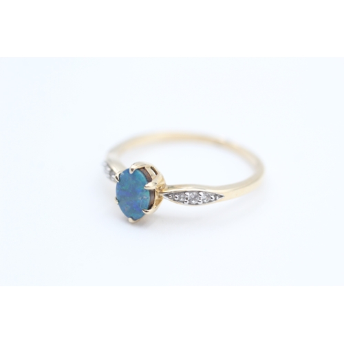 84 - 9ct gold white sapphire accented blue opal doublet set dress ring (1.9g) Size  S