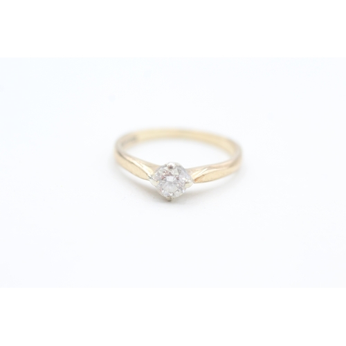 97 - 9ct gold claw set diamond solitaire ring (1.6g) Size  K 1/2