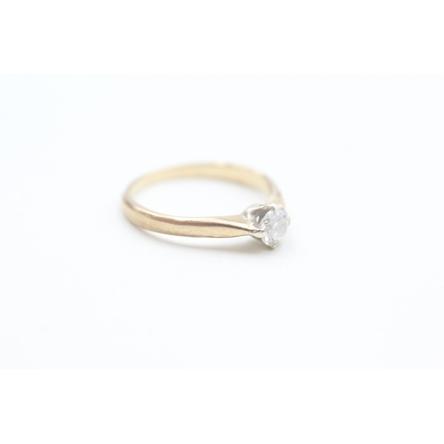 97 - 9ct gold claw set diamond solitaire ring (1.6g) Size  K 1/2