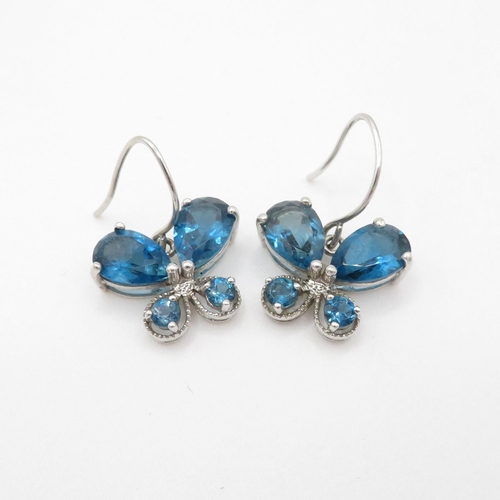 158 - 9ct gold blue topaz earrings (4g)