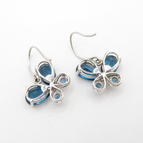 158 - 9ct gold blue topaz earrings (4g)