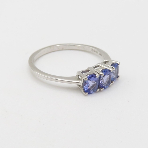 54 - 9ct gold tanzanite three stone ring (2.2g) Size  R 1/2