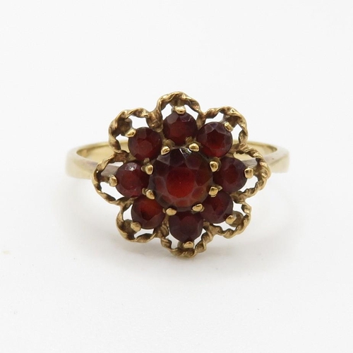 108 - 9ct gold vintage garnet set floral cluster ring (2.2g) Size  N