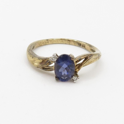 163 - 9ct gold diamond accented iolite set ring (2g) Size  N