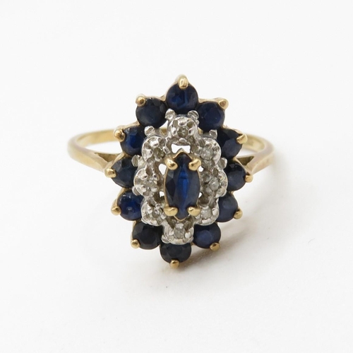 164 - 9ct gold diamond and sapphire set marquise shaped cluster ring (2.1g) Size  N