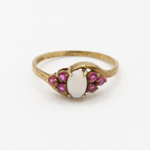 205 - 9ct gold ruby and opal set dress ring (1.5g) Size  P