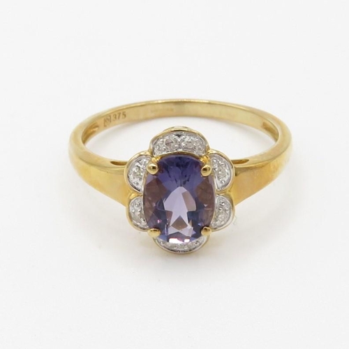 221 - 9ct gold amethyst single stone ring with diamond frame (2.3g) Size  P